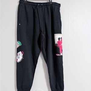 Jordan Black Jogger Pants with Pink & Green Graphic Accents